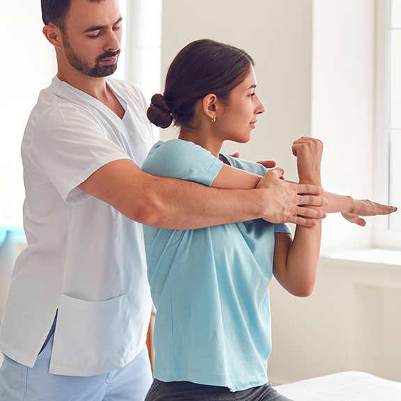 Patient receiving chiopractic adjustment for shoulder pain at Neck, Back, Arm, Leg and Headache Pain Relief Clinic of Marin in San Rafael