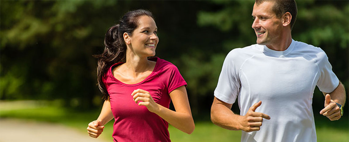 Couple jogging together to get healthy in San Rafael