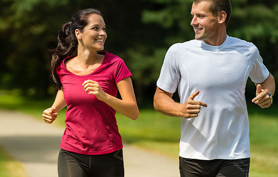 Couple jogging together to get healthy in San Rafael