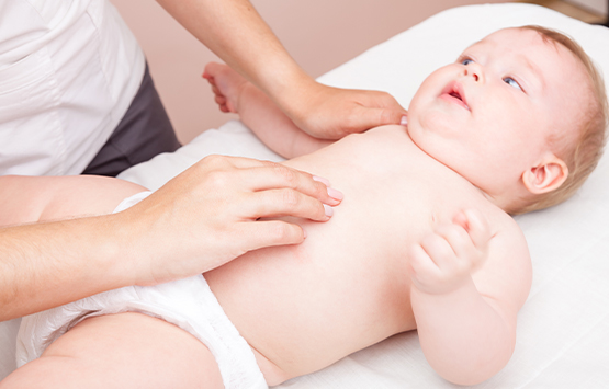 Infant receiving chiropractic care for colic at Neck, Back, Arm, Leg and Headache Pain Relief Clinic of Marin