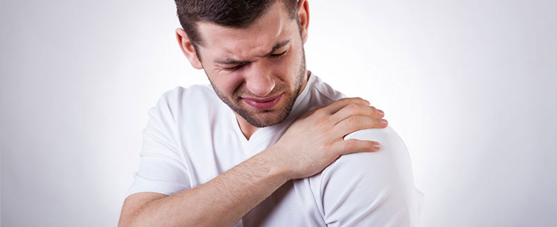 Man suffering with frozen shoulder in need of a chiropractic adjustment at Neck, Back, Arm, Leg and Headache Pain Relief Clinic of Marin in San Rafael