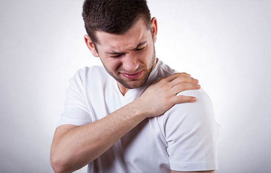 Man suffering with frozen shoulder in need of a chiropractic adjustment at Neck, Back, Arm, Leg and Headache Pain Relief Clinic of Marin in San Rafael