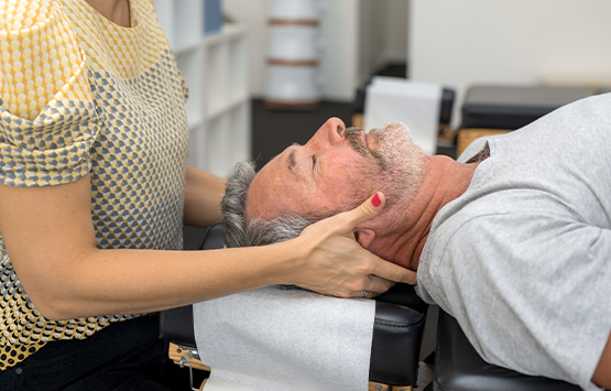 Man receiving chiropractic adjustment for immunity boost