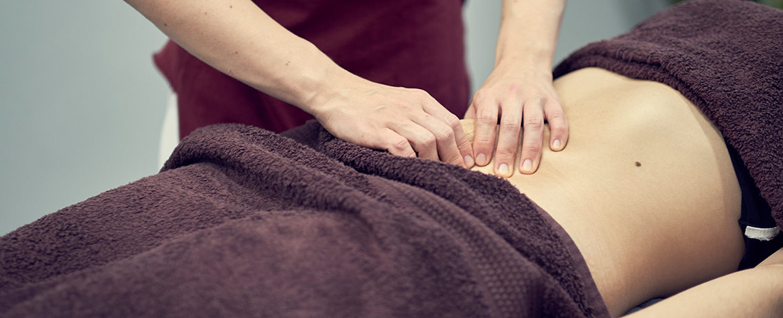 Patient recieving myofascial release treatment for infertility