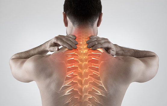 Man suffering with upper back pain