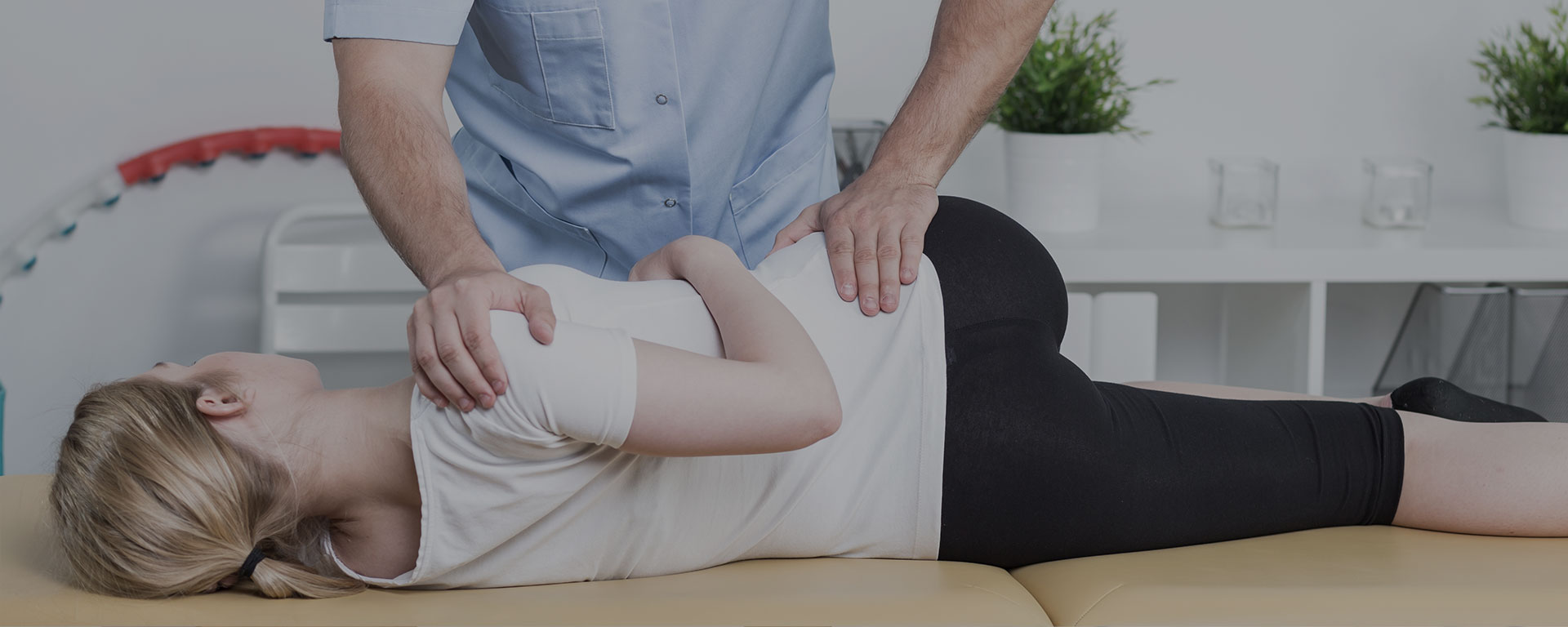 San Rafael Female patient getting a chiropractic adjustment to relieve lower back pain