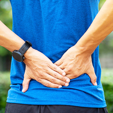 Man suffering with back pain need of chiropractic care in San Rafael