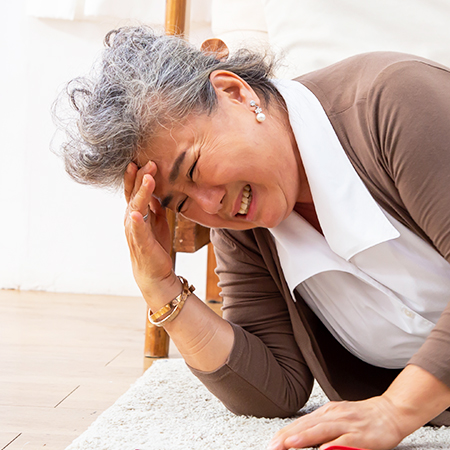 Woman suffering with vertigo in need of chiropractic care in San Rafael